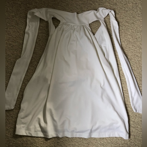 Mockneck white blouse with tie closure. - Picture 3 of 7